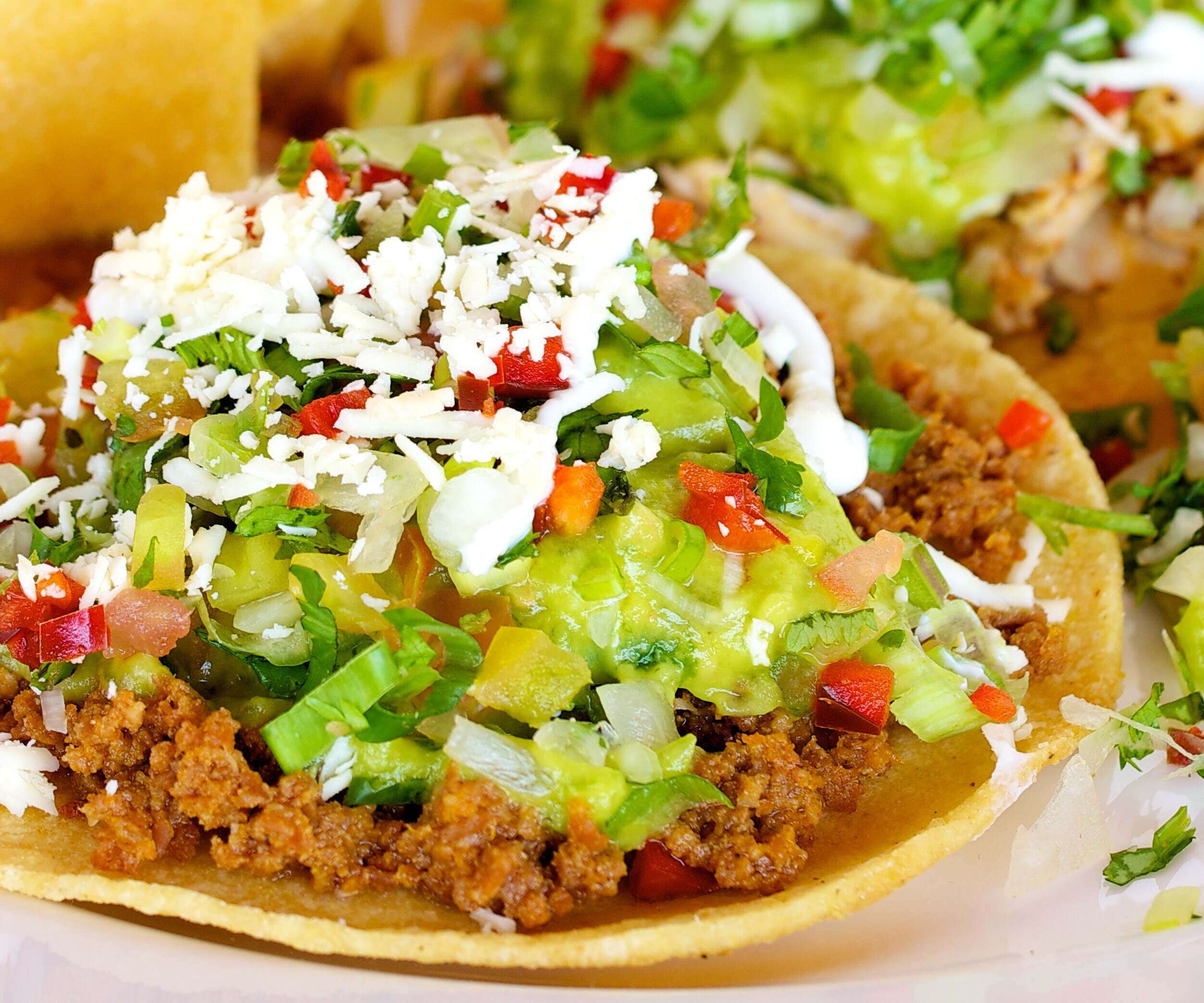 (1) TOSTADA CHICKEN OR BEEF