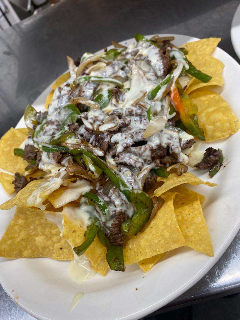 Nachos de Pastor (marinated pork)