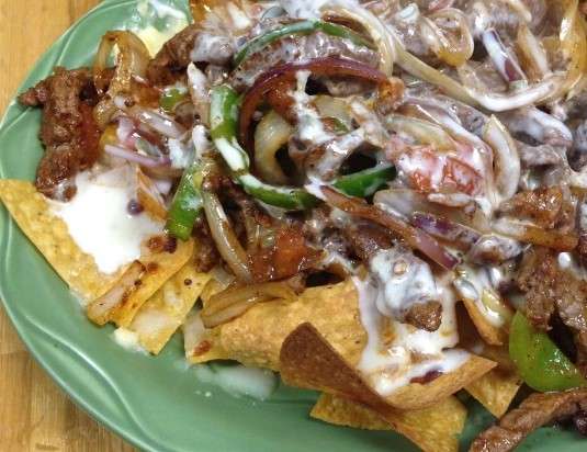 FAJITA CHICKEN OR STEAK NACHOS